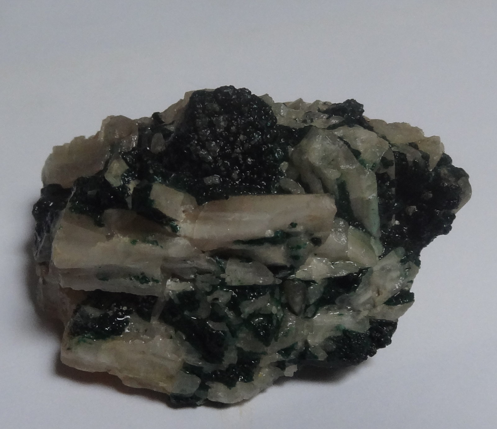 Malachite on Cerussite
(Autor: Dave van Bladel)