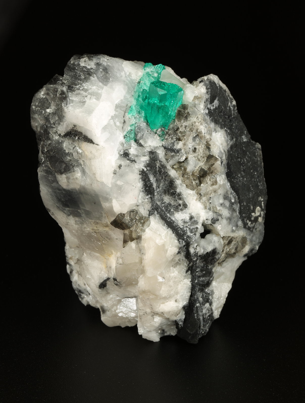 Beryl (variety emerald), Calcite
43x63x56mm, xl=10x6mm
(Autor: Fiebre Verde)