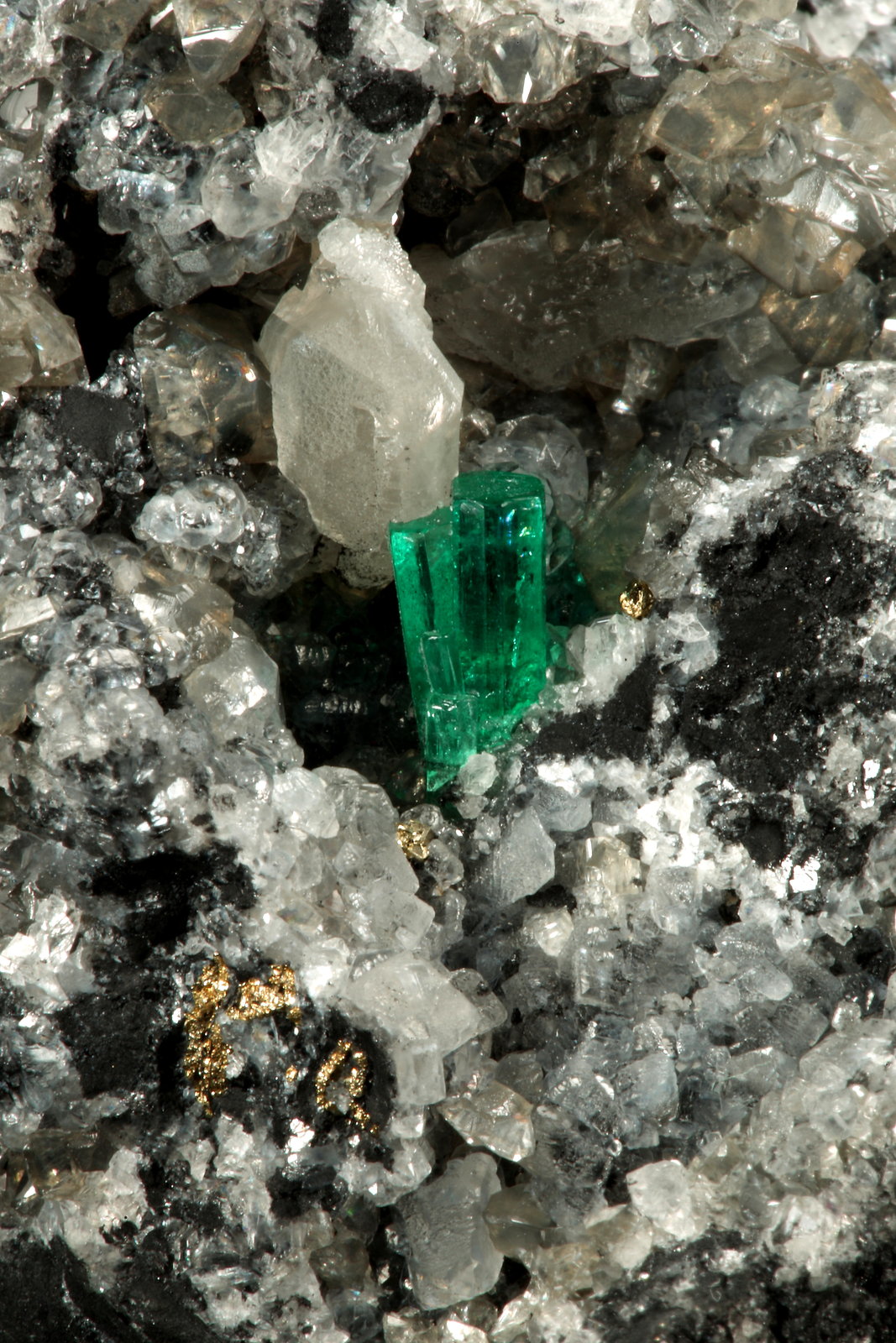 Beryl (variety emerald), Calcite, Pyrite
54x36x60mm, xl=8mm
(Autor: Fiebre Verde)