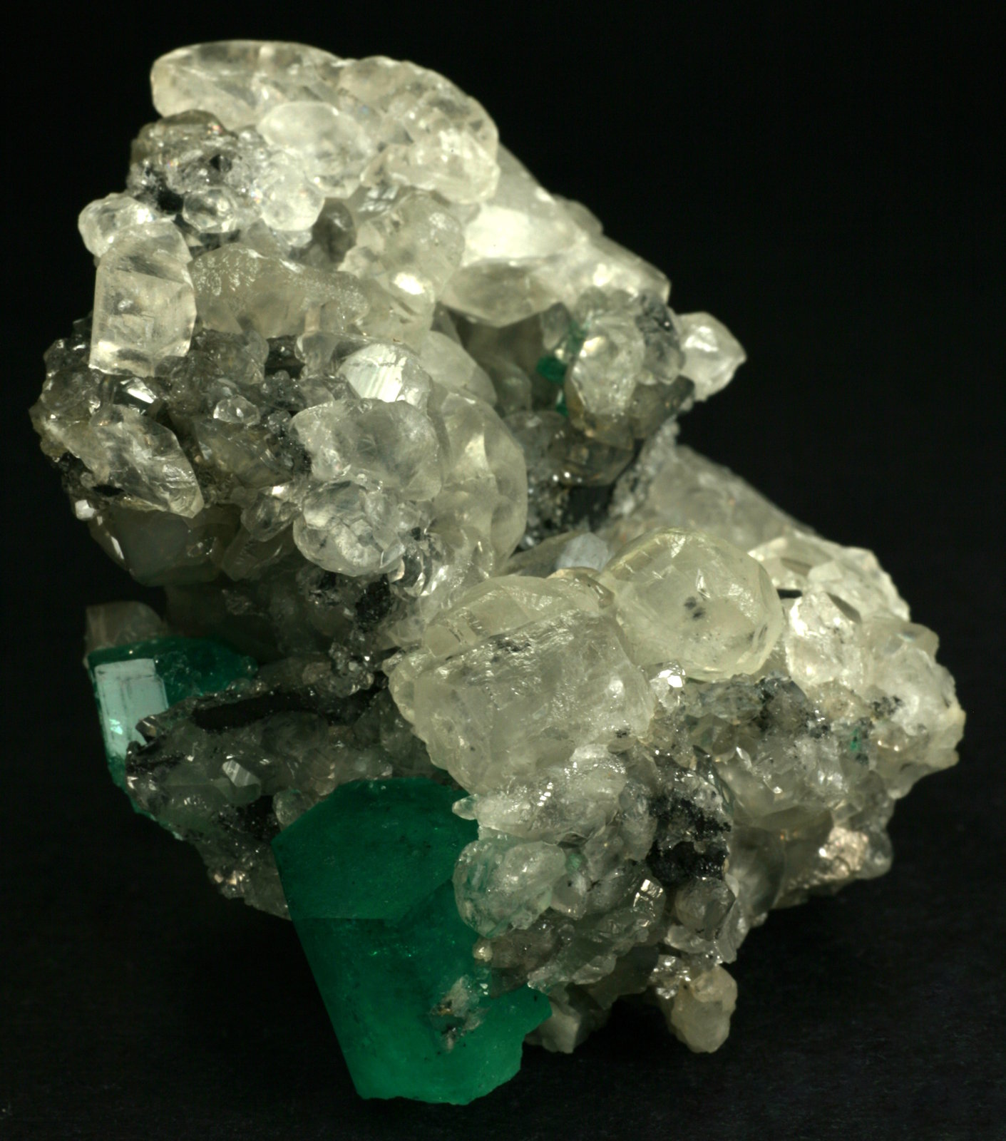 Beryl (variety emerald), Calcite
60x50x35mm
(Autor: Fiebre Verde)