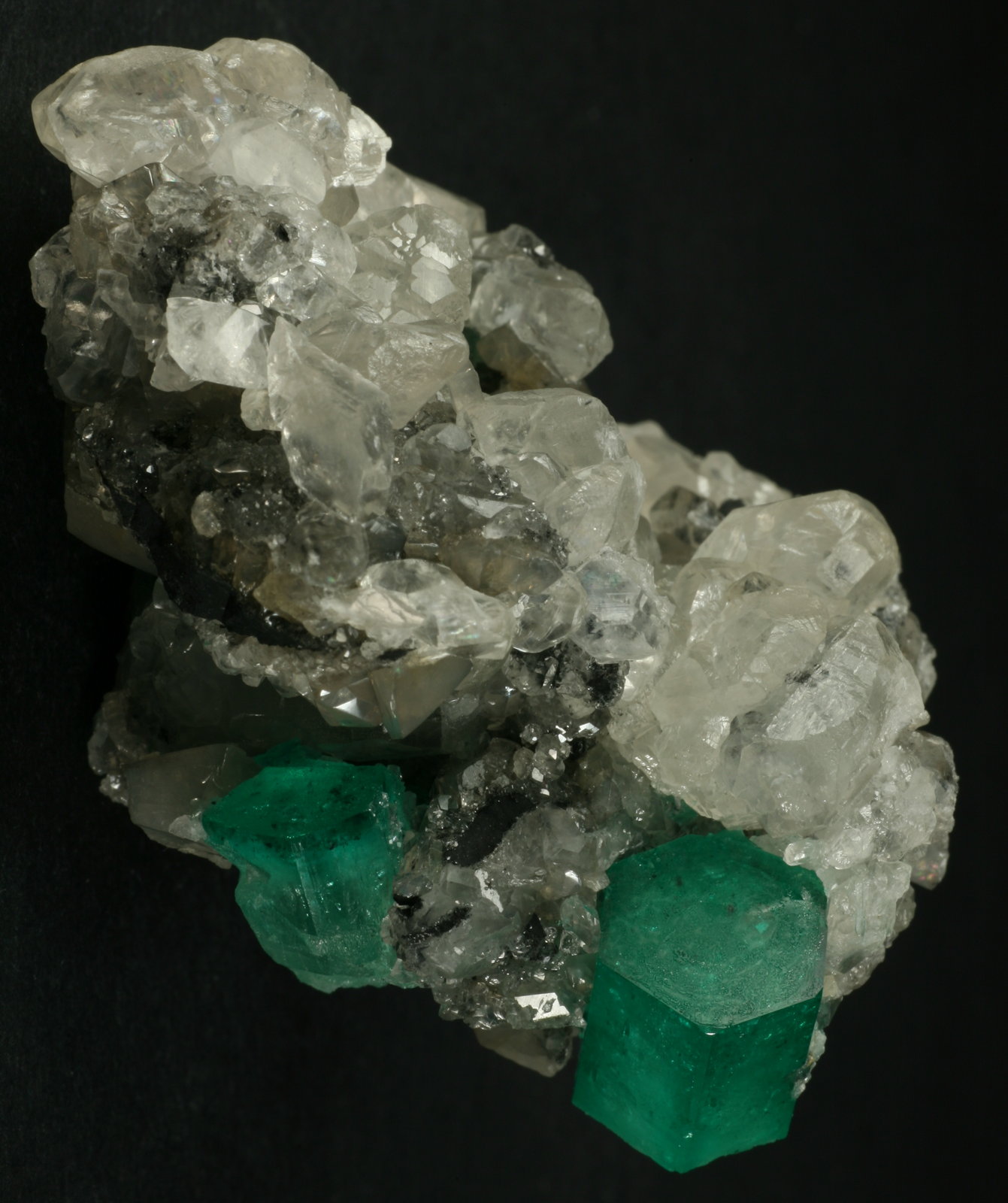Beryl (variety emerald), Calcite
60x50x35mm
(Autor: Fiebre Verde)