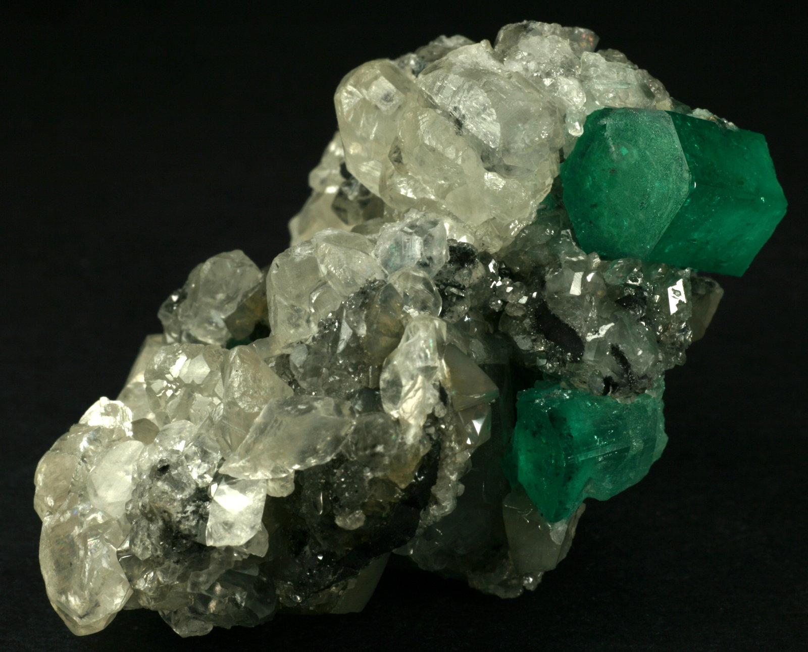 Beryl (variety emerald), Calcite
60x50x35mm
(Autor: Fiebre Verde)