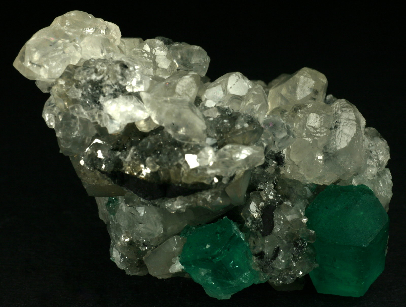 Beryl (variety emerald), Calcite
60x50x35mm
(Autor: Fiebre Verde)