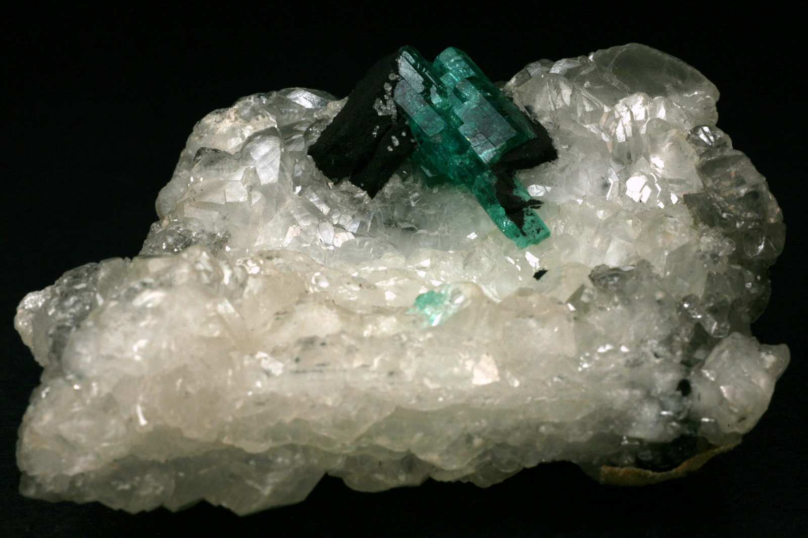 Beryl (variety emerald), Calcite
60x45x28mm
(Autor: Fiebre Verde)