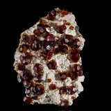Spessartine on Orthoclase
11,5	x	8,5	x	5,0	cm
(Autor: MIM Museum)