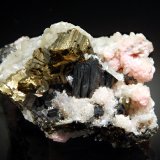 Chalcopyrite, sphalerite, rhodochrosite, and quartz
3.6 x 5.2 cm
(Autor: Michael Shaw)