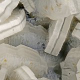 Erionite, Levyne
FOV = 3.1 mm
(Autor: Doug)