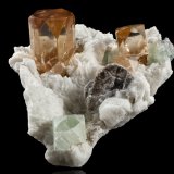 Topaz on Albite and with Fluorite and Mica
15,0 	x	15,0	x	10,0	cm
(Autor: MIM Museum)