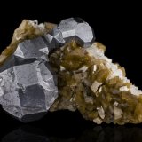 Galena and Siderite
6,5	x	6,0	x	3,5	cm
(Autor: MIM Museum)