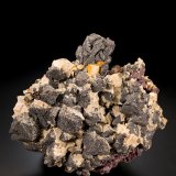 Bismuth with Dolomite and Erythrite
9 x 11 x 8 cm / main crystal: 2.2 cm.
(Autor: MIM Museum)