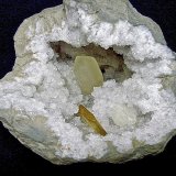 Barite and Calcite on Quartz
geode is 21 cm    calcite is 8 cm     barite is 4.7 cm
(Autor: Bob Harman)