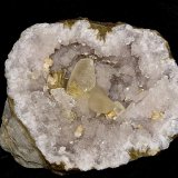 Barite and Calcite on Quartz and with Dolomite
geode cavity is 15 x 13 cm largest calcite is about 5 cm and the barites are about 2.5 cm
(Autor: Bob Harman)