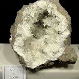 Calcite on Quartz
the geode is about 24 cm and the calcites are up to 2.5 cm
(Autor: Bob Harman)