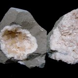 Dolomite and Calcite on Dolomite
Calcites 1.5 cm, The larger example is 15 cm across
(Autor: Bob Harman)