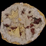Calcite, Barite, Dolomite (variety iron rich dolomite) on Quartz
geode is 22 cm x 22 cm.    The largest calcite is 4.5 cm.     The barite groupings are up to 5.0 cm. The dolomite groupings are up to 4.0 cm
(Autor: Bob Harman)