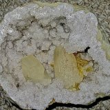 Calcite, Baryte and Quartz
Geode is 23 cm. The larger calcite is 7.5 cm; the smaller one is about 6.0 cm. the barite cluster is 3.7 cm
(Autor: Bob Harman)