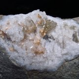 Baryte and Dolomite on Quartz
12 cm with the grouping being 5 cm and the largest Baryte being 2 cm
(Autor: Bob Harman)