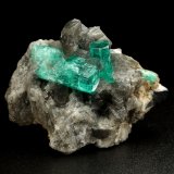 Beryl (variety emerald), Calcite, Pyrite
38x24x29mm, largest xl=17mm
(Autor: Fiebre Verde)