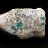 Beryl (variety emerald), Calcite, Quartz, Fluorite
100x61x65mm, main xls=7 &amp; 7mm
(Autor: Fiebre Verde)
