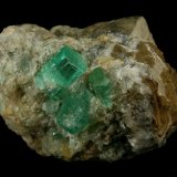 Beryl (variety emerald), Calcite
52mm across
(Autor: Fiebre Verde)