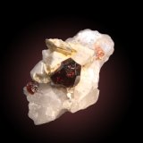 Spessartine, Muscovite and Quartz.
25mm x 32mm x 25mm
(Autor: Firmo Espinar)