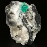 Beryl (variety emerald), Calcite
43x63x56mm, xl=10x6mm
(Autor: Fiebre Verde)