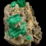Beryl (variety emerald), Calcite
60x47x49mm, central xl=16mm
(Autor: Fiebre Verde)
