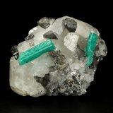 Beryl (variety emerald), Calcite, Dolomite
61x50x38mm, xls=22 &amp; 17mm
(Autor: Fiebre Verde)