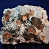 Topaz, Quartz (variety smoky quartz),  Albite (variety cleavelandite), Feldspar, Hematite
200 mm x 150 mm x 95 mm
(Autor: Don Lum)