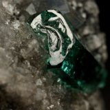 Beryl (variety emerald), Calcite, Dolomite
triangle side=35mm, xl=11mm
(Autor: Fiebre Verde)