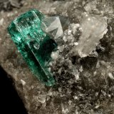Beryl (variety emerald), Calcite, Dolomite
triangle side=35mm, xl=11mm
(Autor: Fiebre Verde)