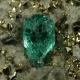Beryl (variety emerald), Calcite, Pyrite
xl=5mm
(Autor: Fiebre Verde)
