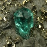 Beryl (variety emerald), Calcite, Pyrite
xl=5mm
(Autor: Fiebre Verde)