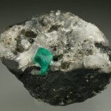 Beryl (variety emerald), Calcite, Pyrite
35x45mm, xl=6mm
(Autor: Fiebre Verde)