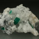 Beryl (variety emerald), Calcite, Parisite
70x45x50mm
(Autor: Fiebre Verde)
