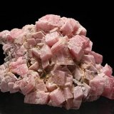 Rhodochrosite
H:5.2cm xW:3.6cm xD:2.5cm; Largest Crystal: 1.1cm
(Autor: Adrian Pripoae)