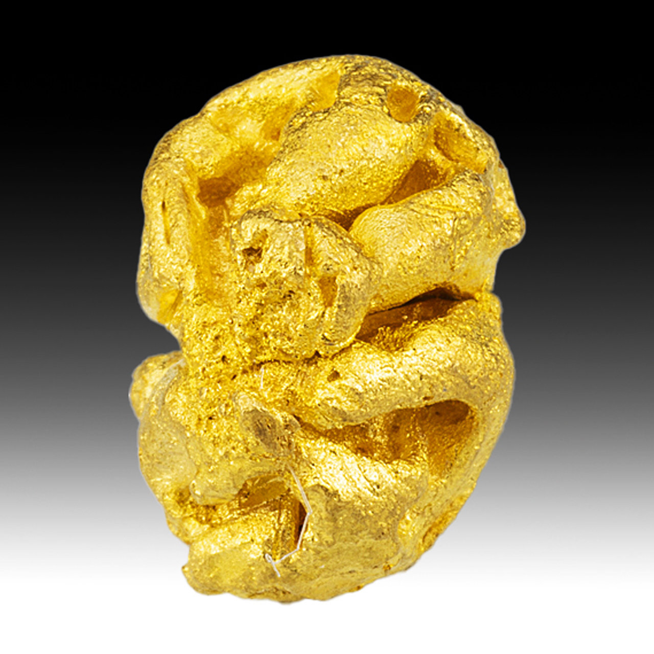 Oro
10,5 mm x 7,5 mm x 7,0 mm. Masa: 4,00.
(Autor: Carles Millan)