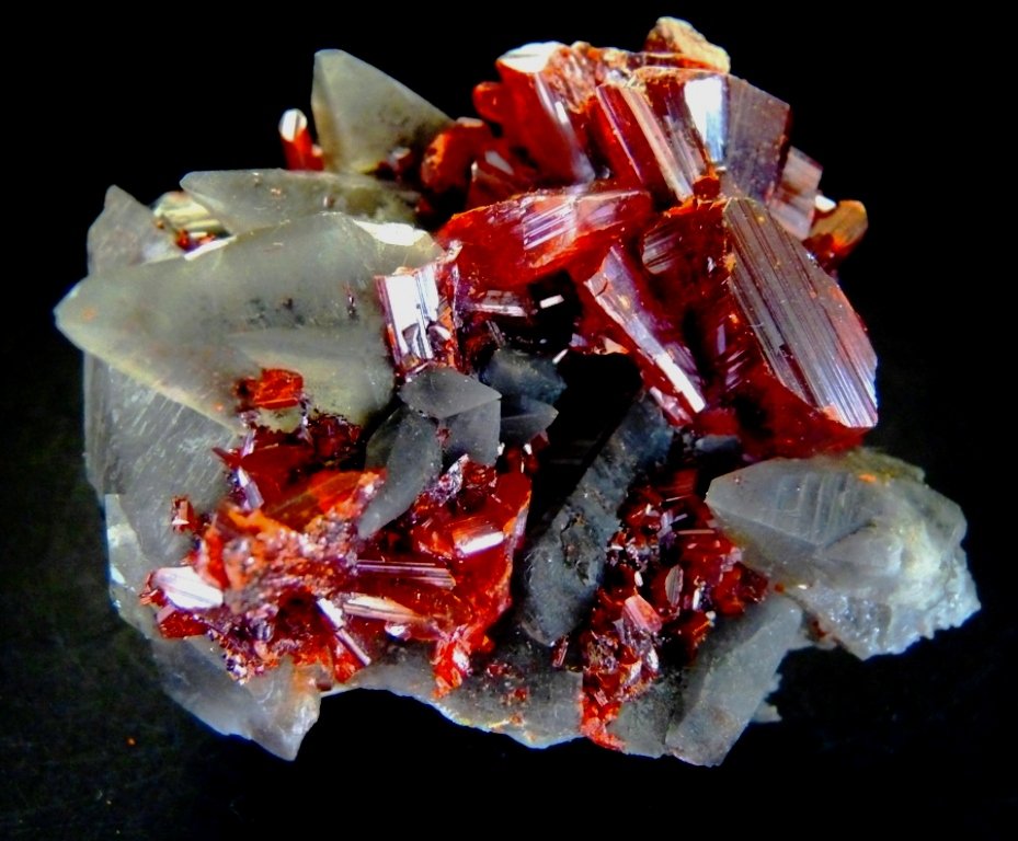 Rejalgar y Calcita.
60x40 mm.
(Autor: Jesus Franquesa Baucells)