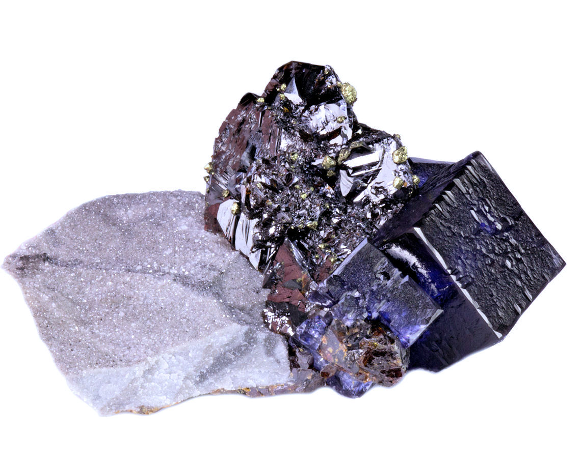 Fluorita, esfalerita, calcopirita
65 mm x 50 mm x 24 mm. Cristal mayor de fluorita: 17 mm en la arista
(Autor: Carles Millan)