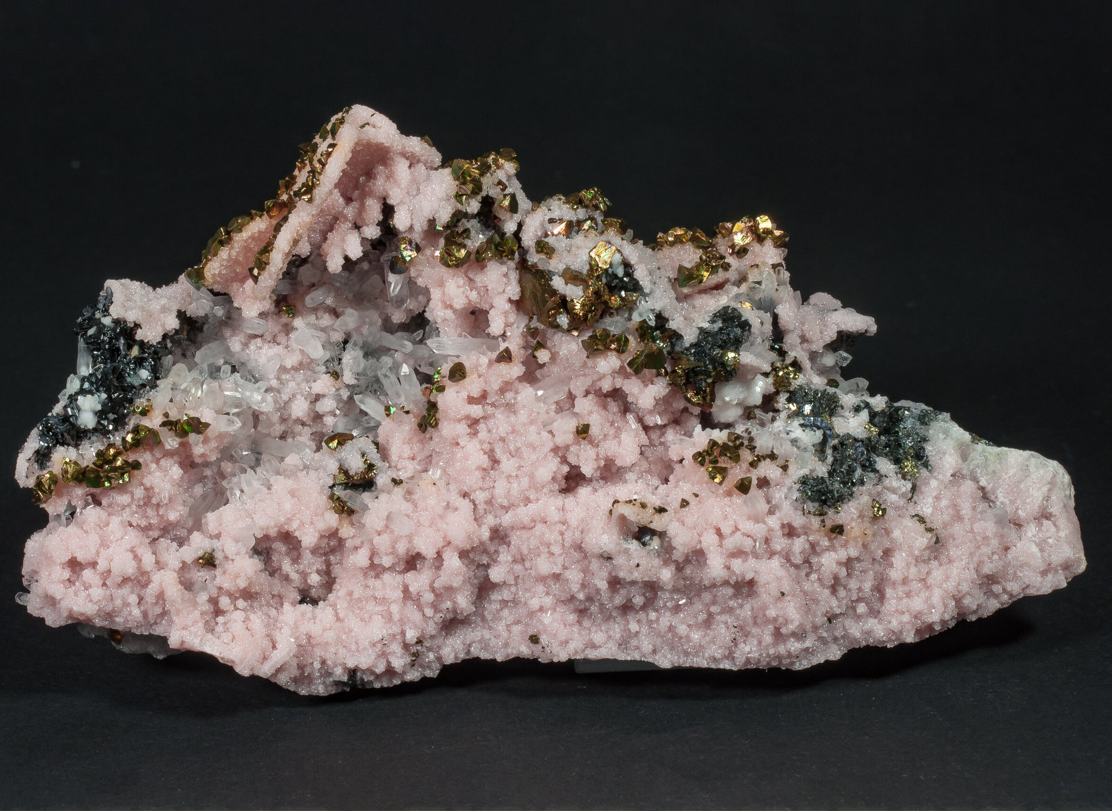 Rodocrosita, Calcopirita, Esfalerita, Cuarzo
11 x 6 cm.
(Autor: Antonio P. López)