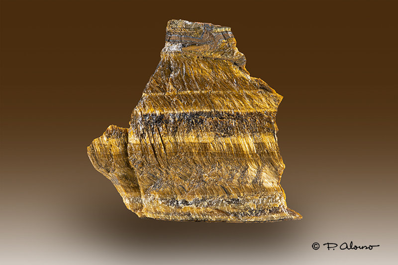 Cuarzo (variedad ojo de tigre)
6,5cm x 6cm x 3cm
(Autor: Pere Alonso)