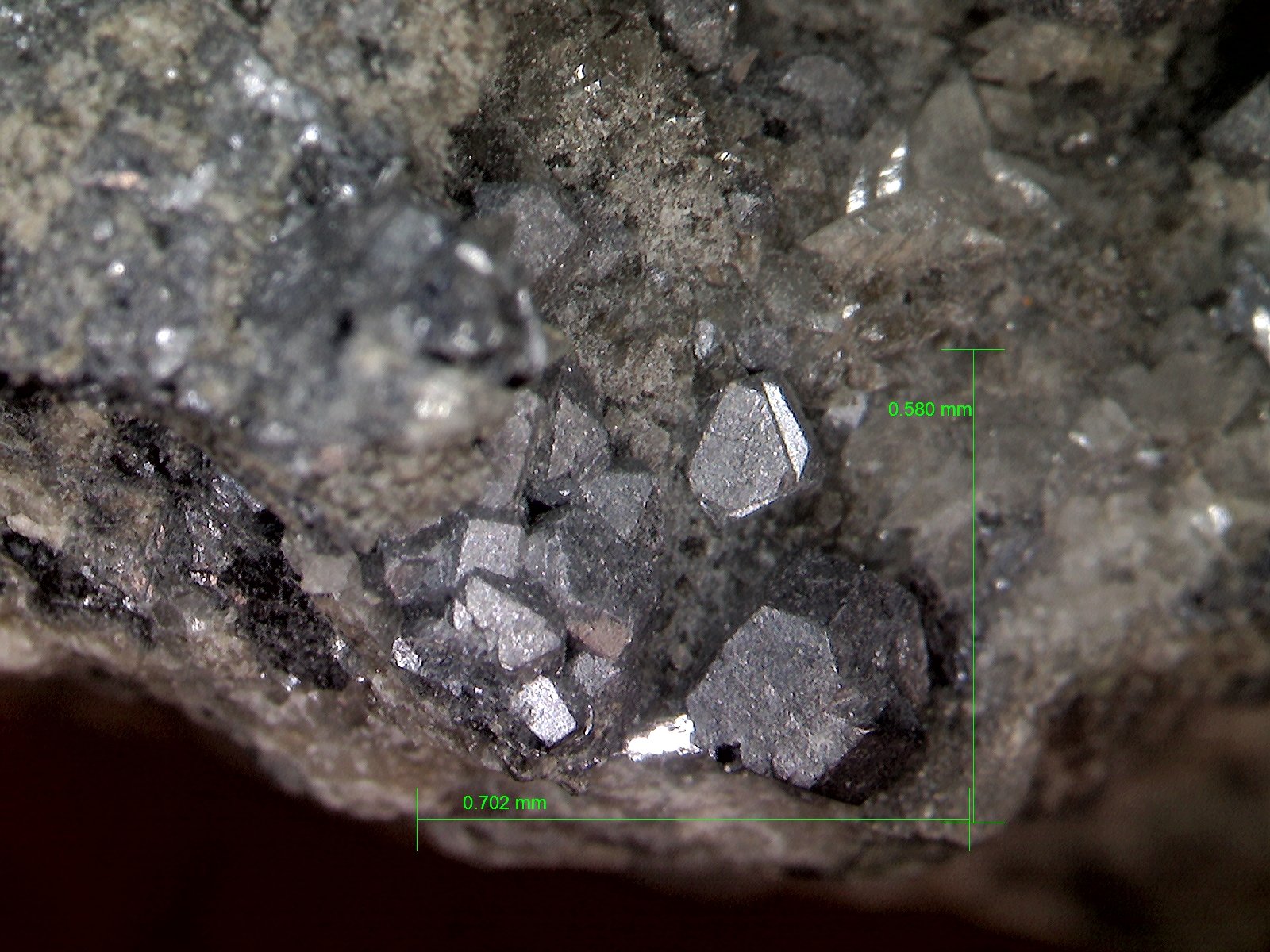 Galena.
0´702 x 0´580 mm.
(Autor: Jesus Franquesa Baucells)