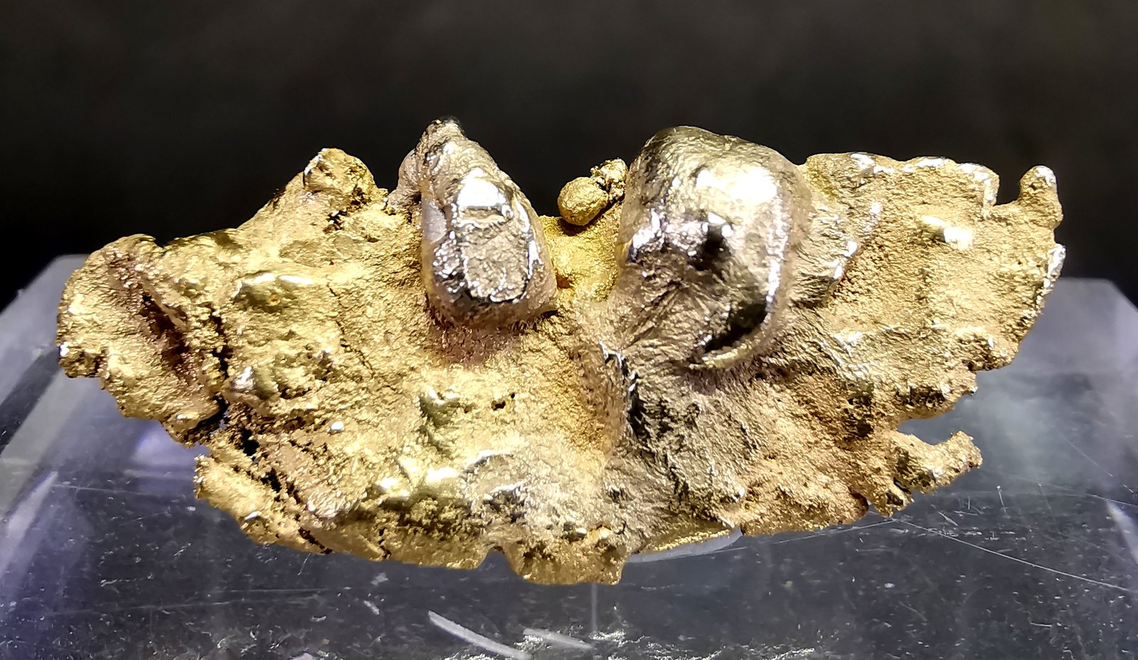 Oro + Platino
3.2 cm
(Autor: Diego Navarro)