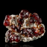 Spessartina con Ortoclasa
7,0 x 6,0 x 3,5 cm
(Autor: Museo MIM)