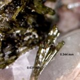 Epidota y Cuarzo
0.484 x 0.631 x 0.125 mm.
(Autor: Jesus Franquesa Baucells)