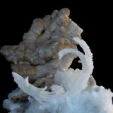 Yeso (variedad sericolita)
Pieza: 8,5x4,4 cm. Cristal curvado: 3,3 cm.
(Autor: DAni)
