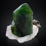 Diópsido en Calcita con Flogopita
7 x 5 x 6.5 cm / cristal principal: 6 cm
(Autor: Museo MIM)