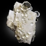 Fluorita en Calcita
14 x 11 x 16 cm / Cristal principal: 4 cm
(Autor: Museo MIM)