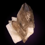 Cuarzo (variedad ahumado) y Ortoclasa (variedad adularia)
78mm x 94mm x 65mm
(Autor: Firmo Espinar)