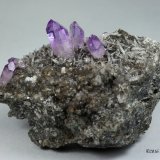 Cuarzo (variedad amatista), Laumontita, Calcita
8 x 6 x 3 centimetros
(Autor: Ricardo Melendez)